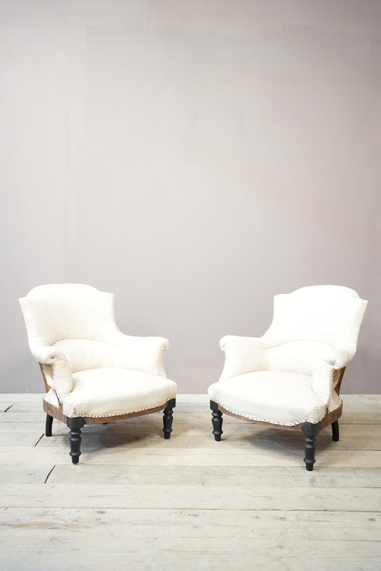 Pair of Napoleon III plain shield back armchairs