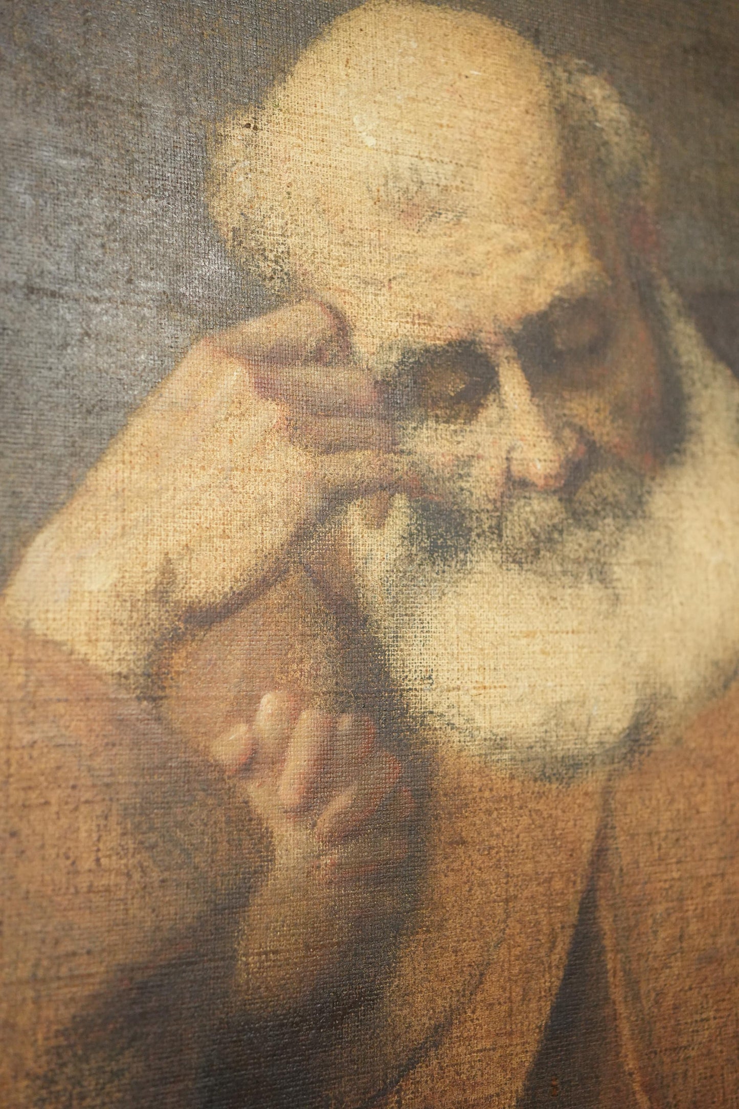 19th century Italian painting of a seated Monk