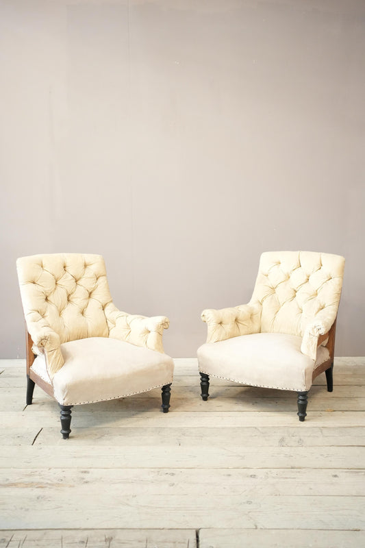 Pair of Napoleon III buttoned square back armchairs