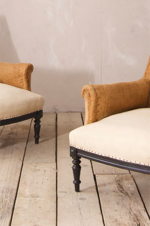Pair of Napoleon III Square back armchairs with carved ebonised frame