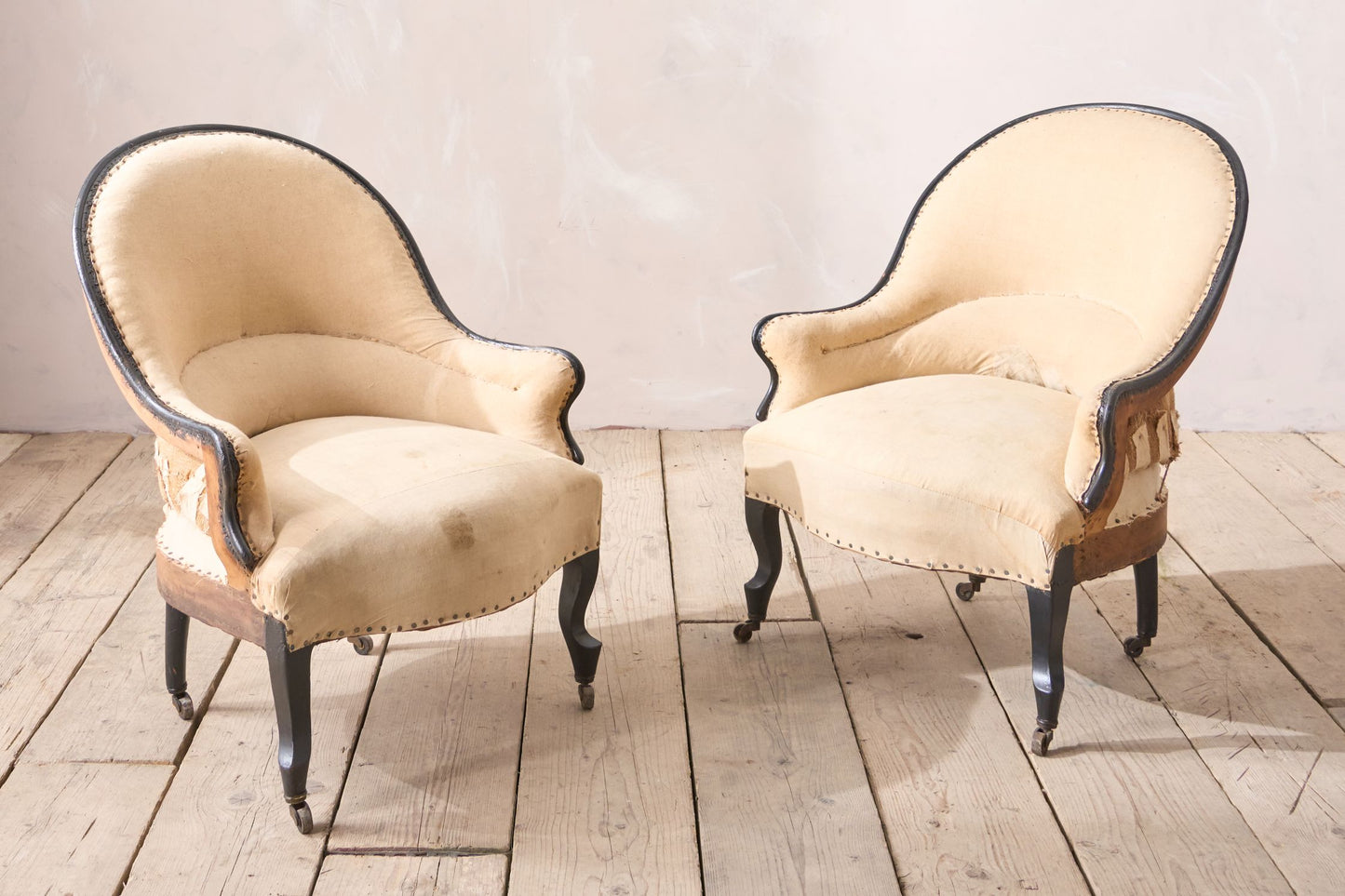 Pair of small Napoleon III tub chairs with ebonised frame