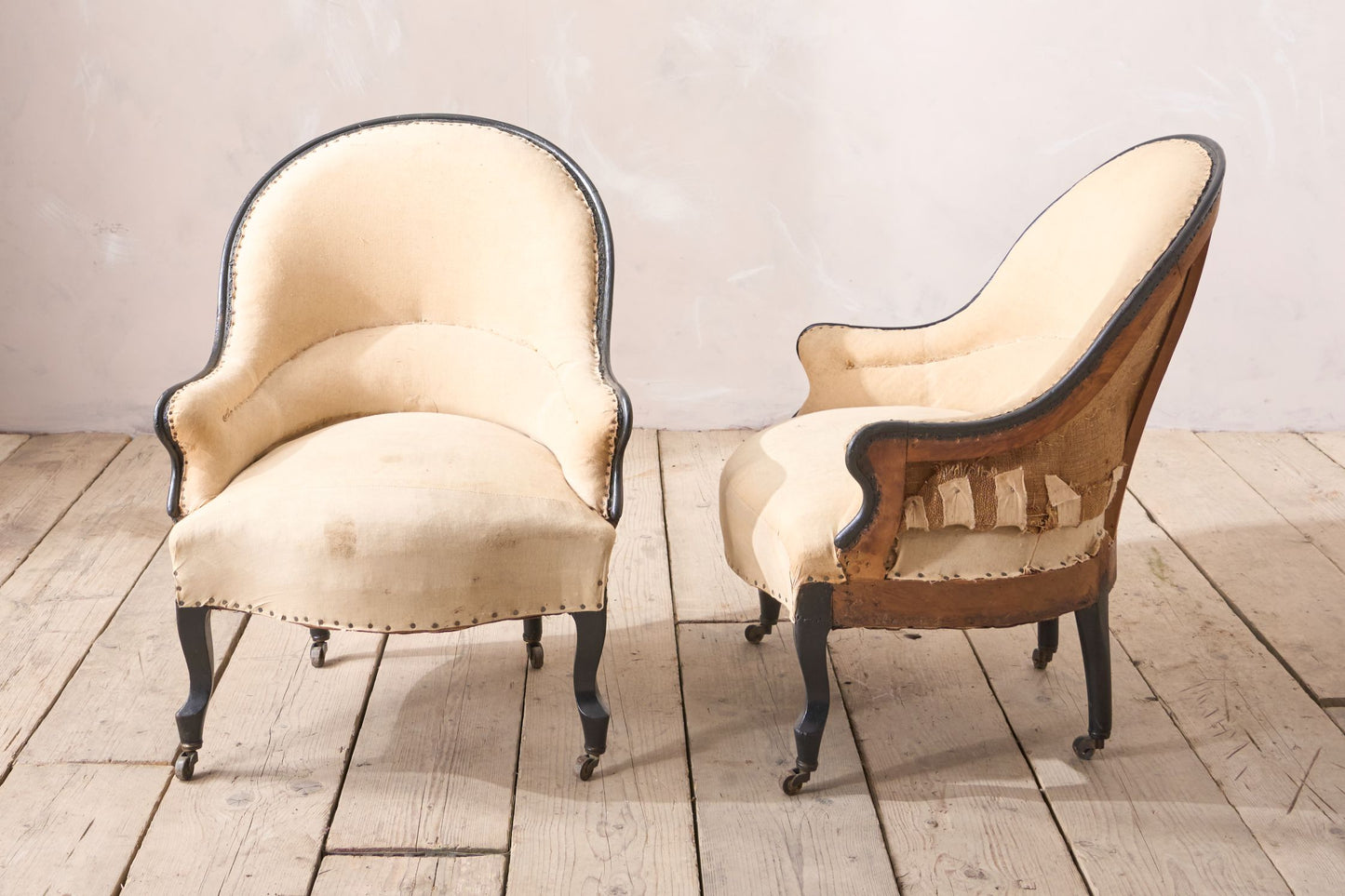 Pair of small Napoleon III tub chairs with ebonised frame