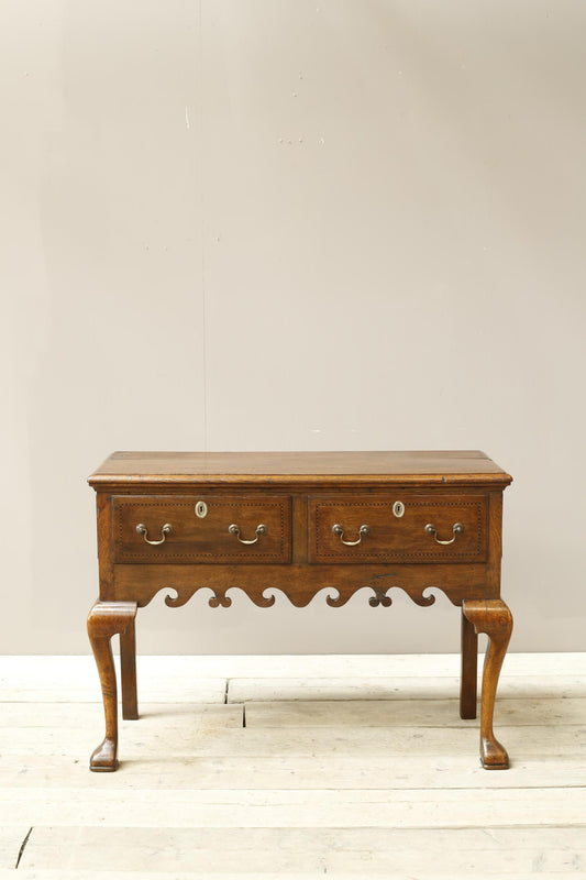 18th century Georgian lowboy with fret work boarder