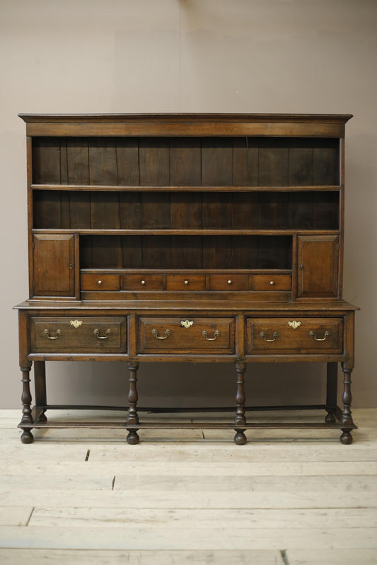 18th century English oak dresser on tall legs