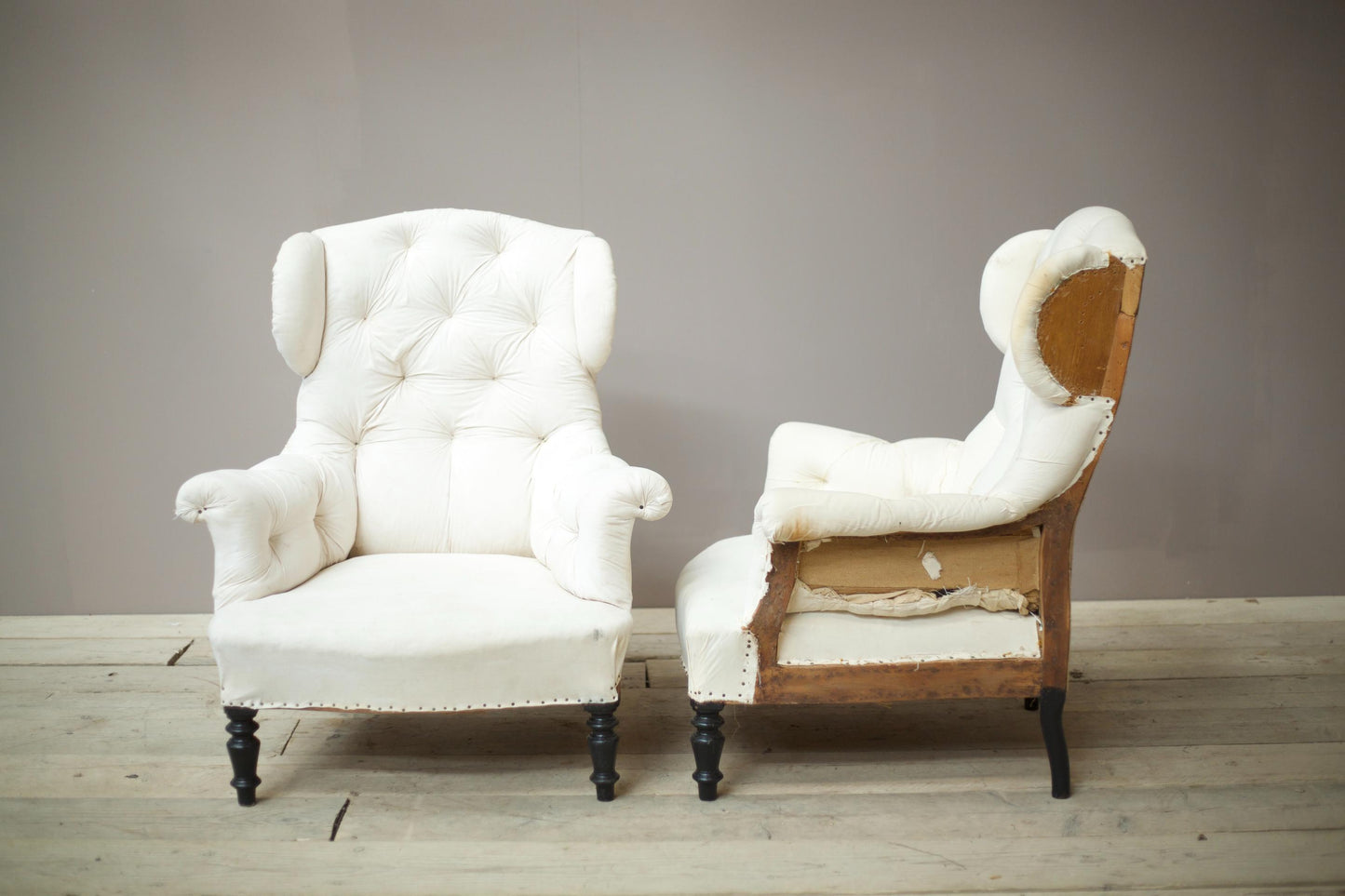 Pair of Napoleon III Buttoned wingback armchairs