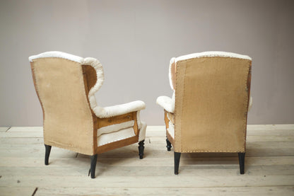 Pair of Napoleon III Buttoned wingback armchairs