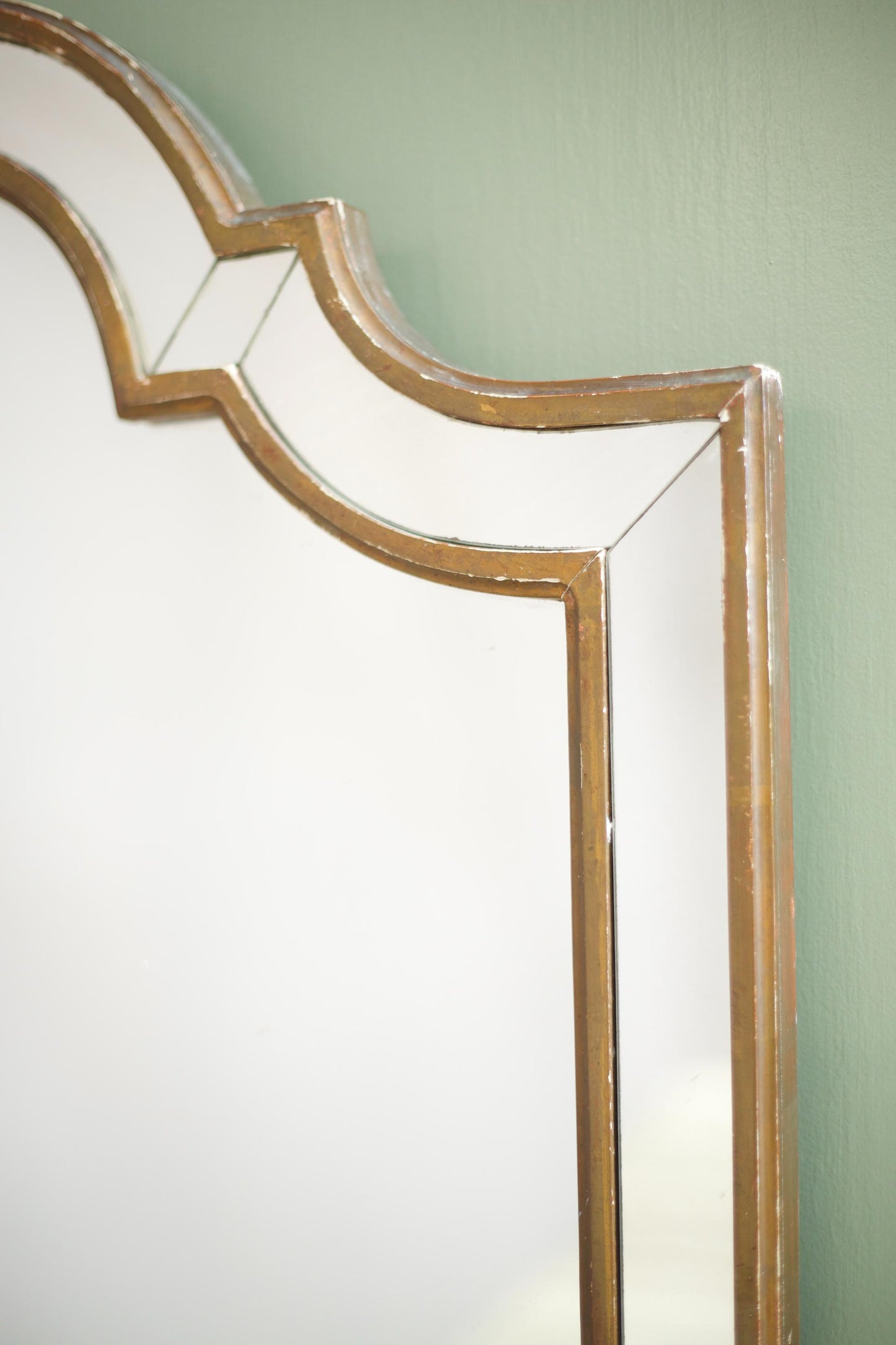 Unusual shaped early 20th century gilt mirror