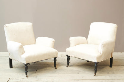 Pair of Napoleon III cushioned arm armchairs