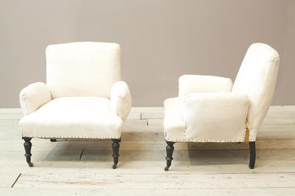 Pair of Napoleon III cushioned arm armchairs