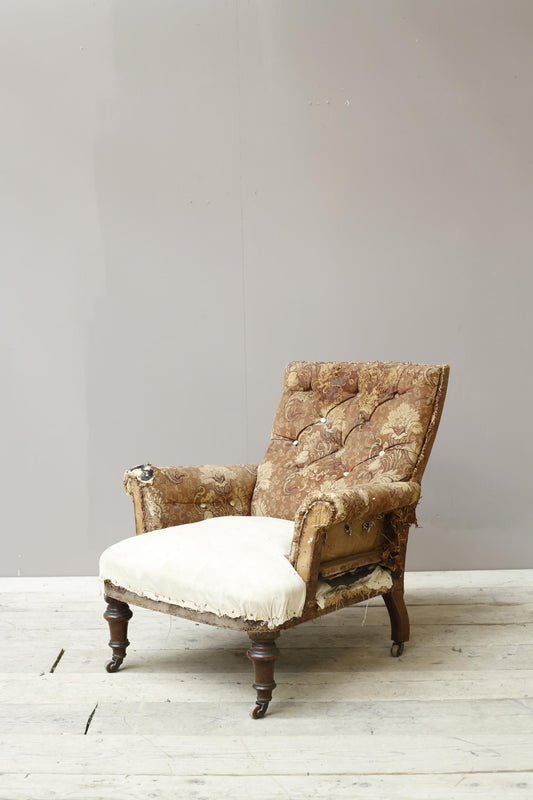 Victorian English country house armchair with buttoned back