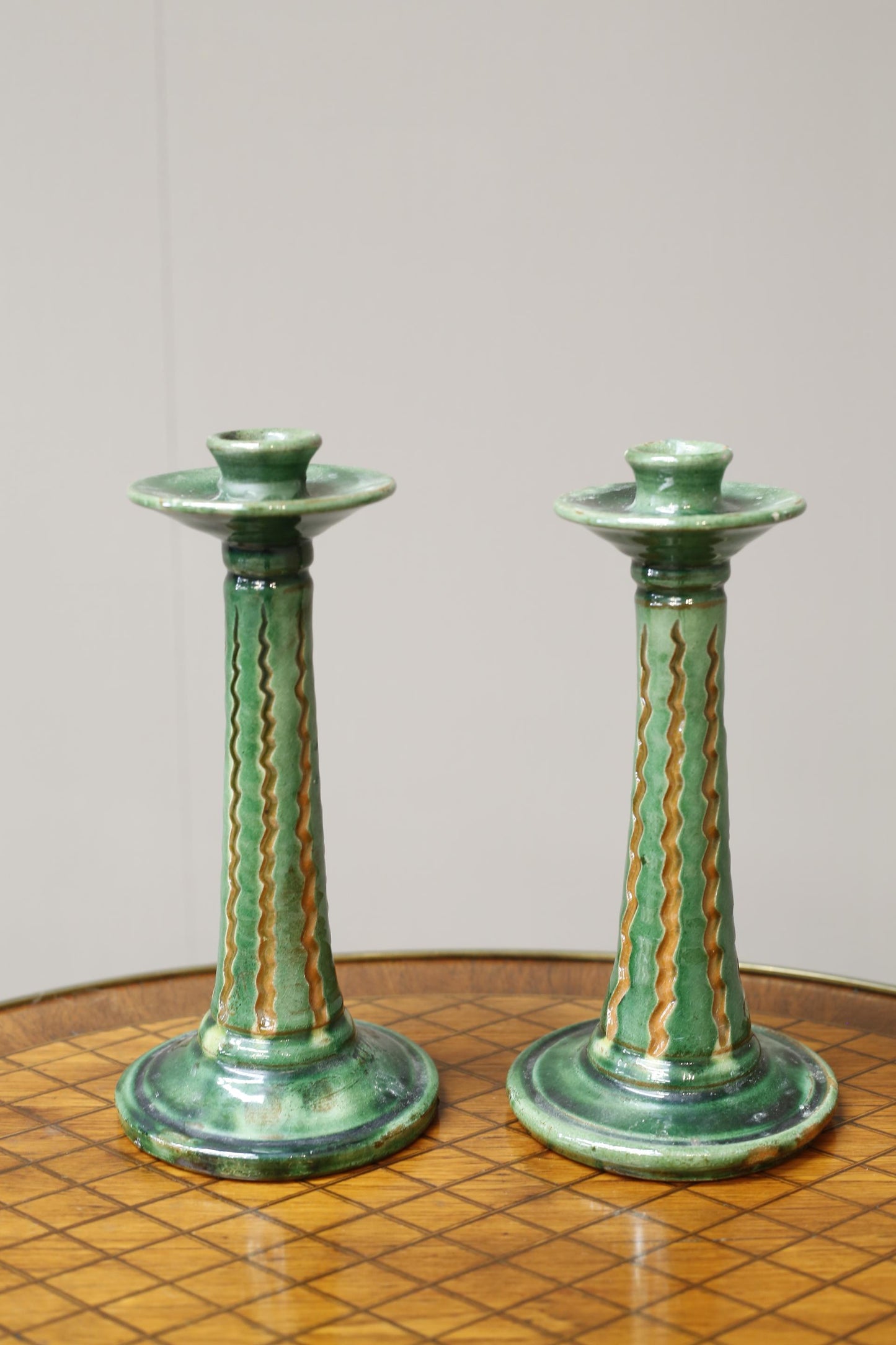 Pair of early 20th century Spanish Green glazed candle sticks