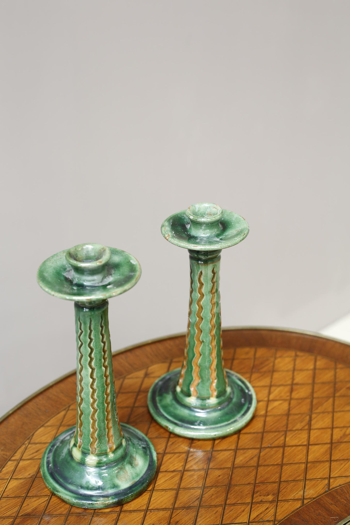 Pair of early 20th century Spanish Green glazed candle sticks