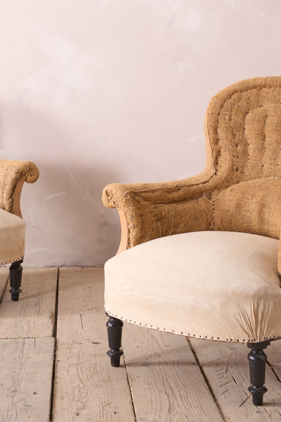 Pair of hessian curved back Napoleon III armchairs