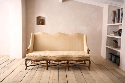 Early 19th century carved stretcher French settee