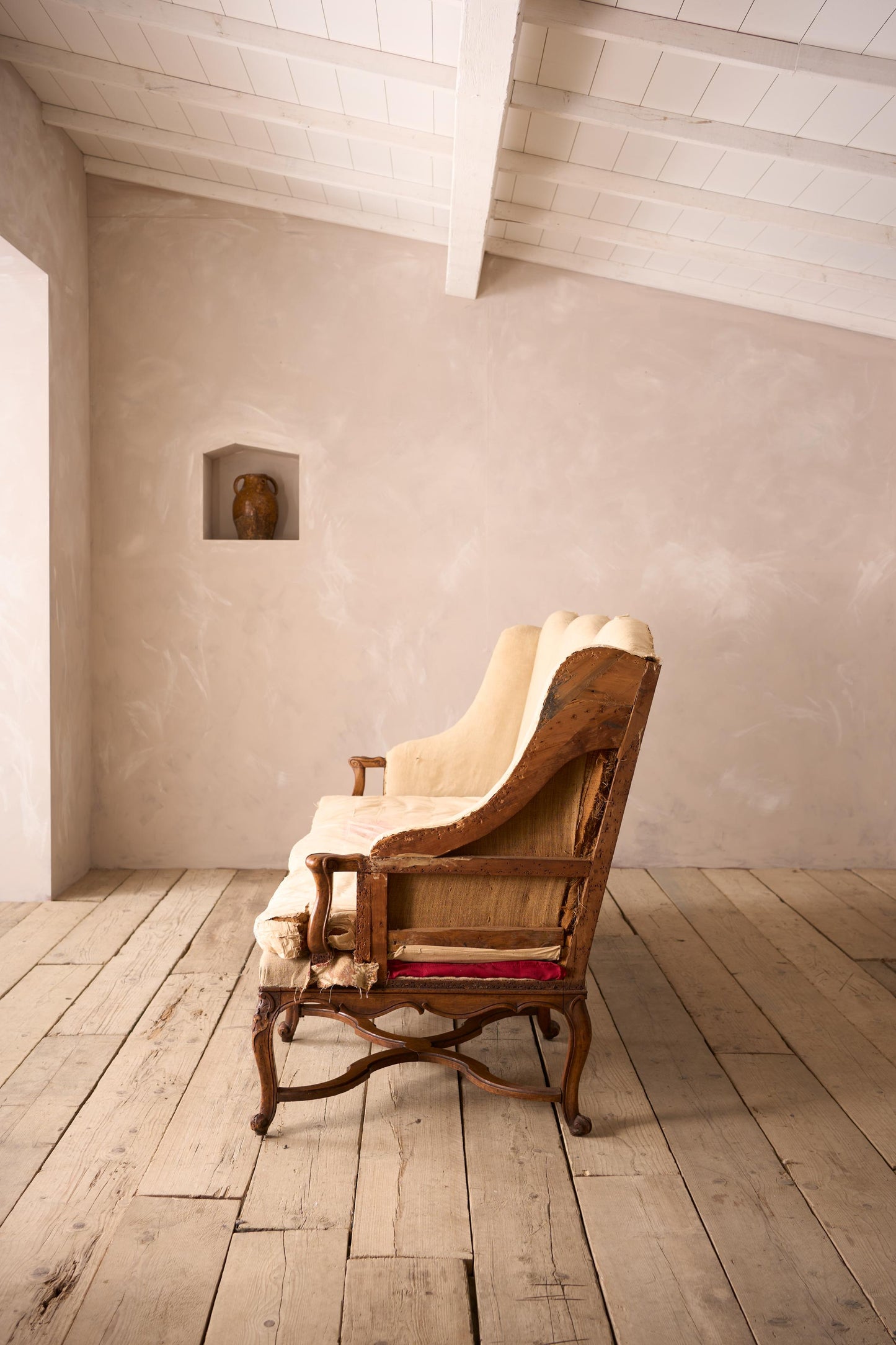 Early 19th century carved stretcher French settee