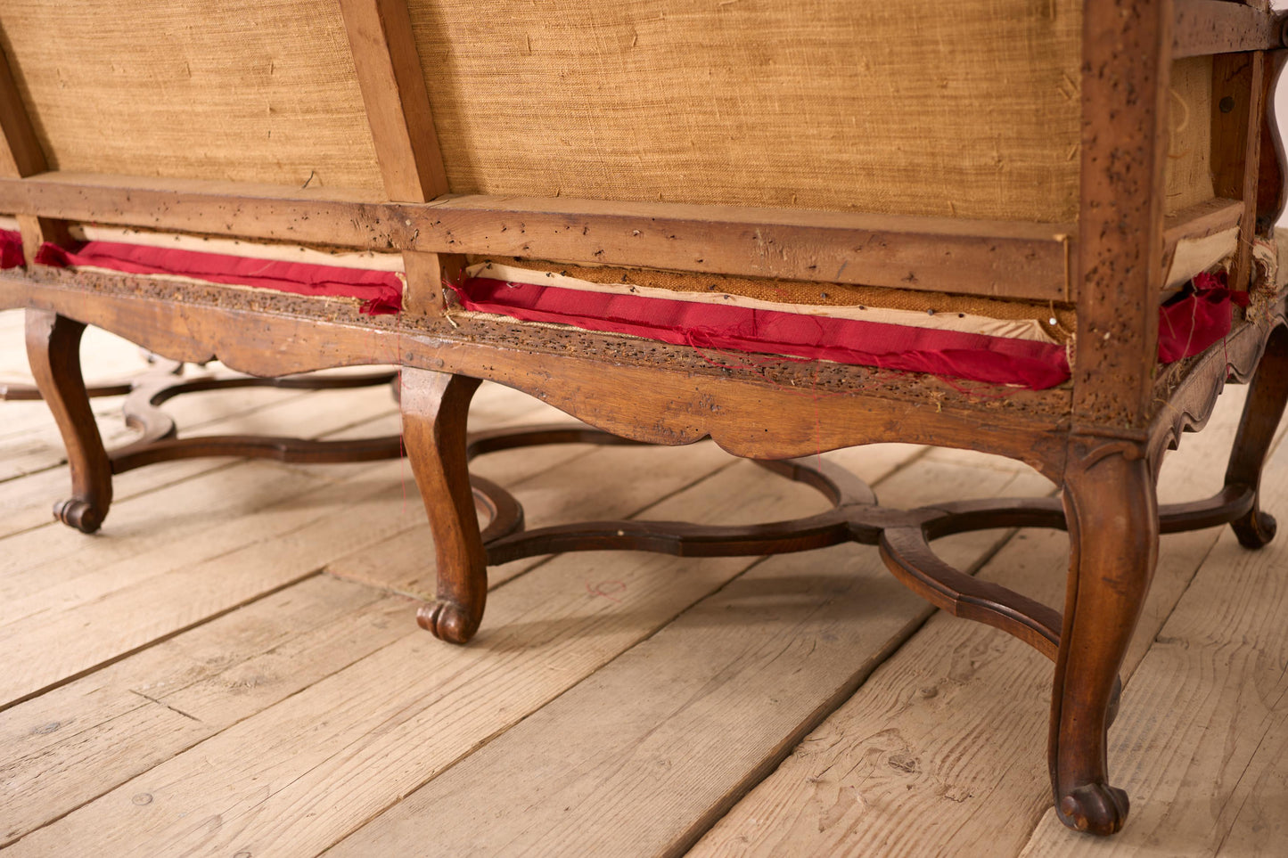 Early 19th century carved stretcher French settee