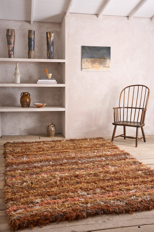 British made Selvedge rug - orange and browns