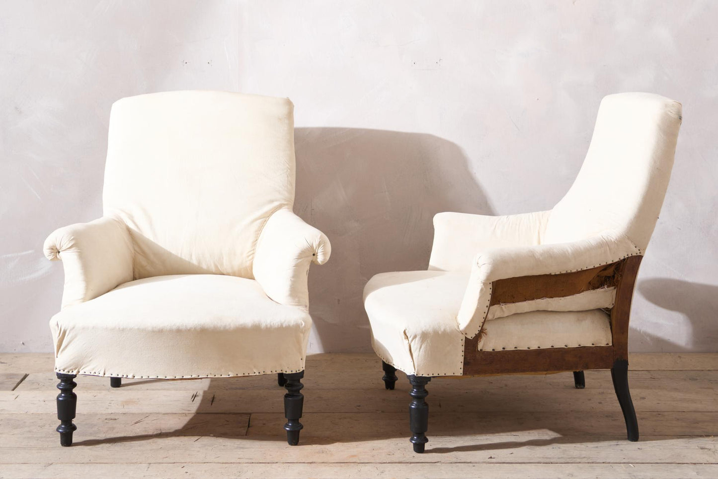 Pair of Napoleon III plain square back armchairs