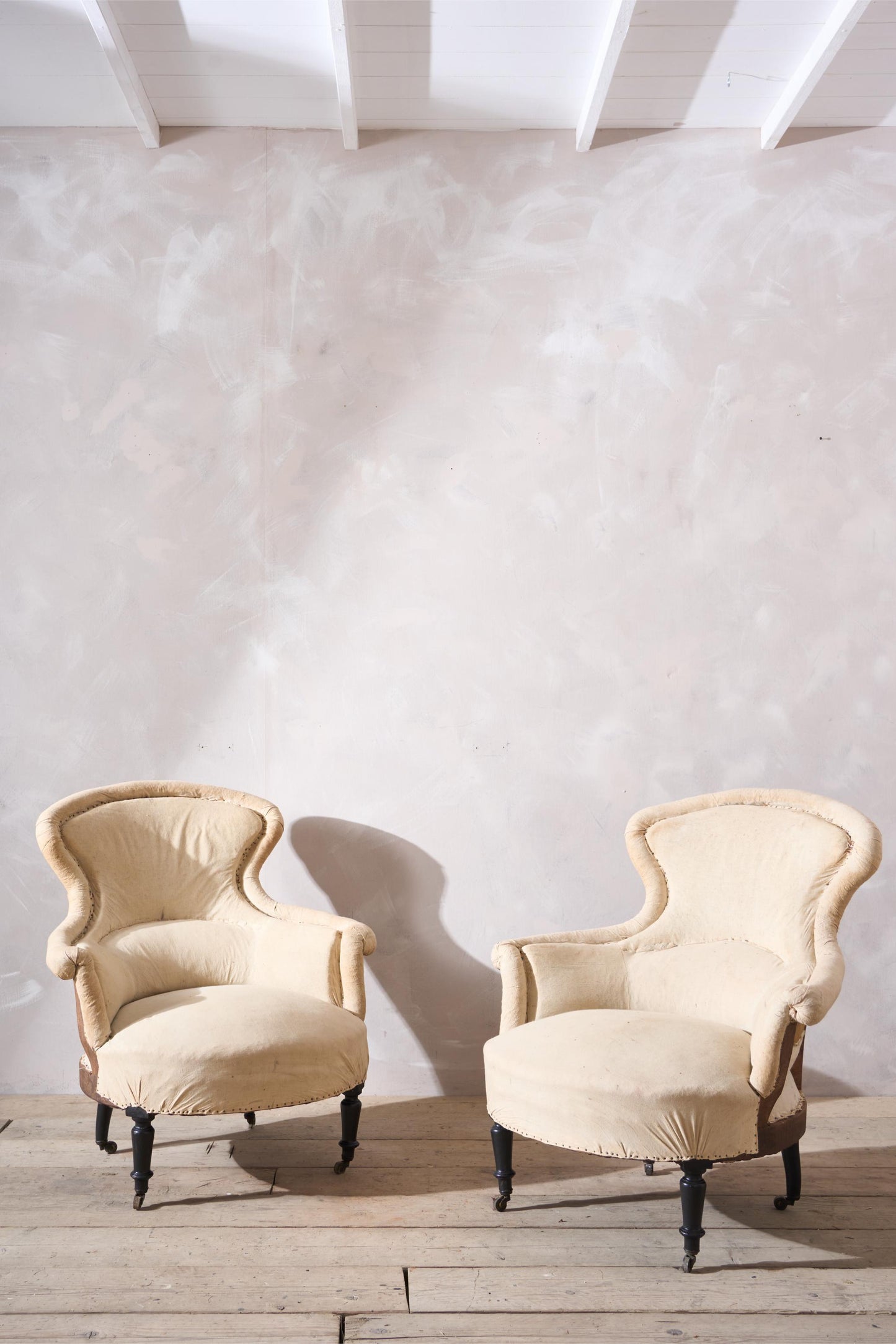 Pair of Napoleon III Piecrust fishtail armchairs