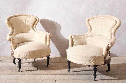 Pair of Napoleon III Piecrust fishtail armchairs