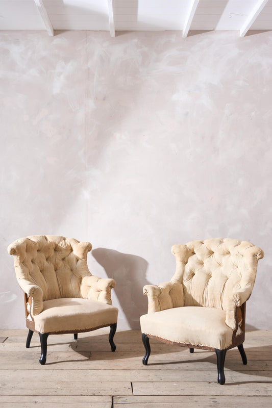 Pair of Napoleon III buttoned fishtail armchairs