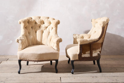 Pair of Napoleon III buttoned fishtail armchairs