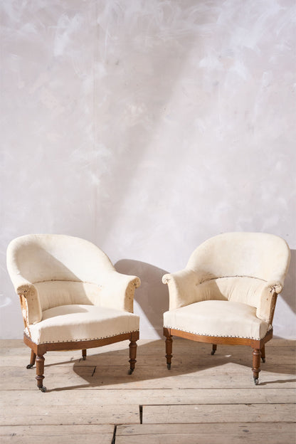 Pair of 19th century French tub chairs with show wood frame