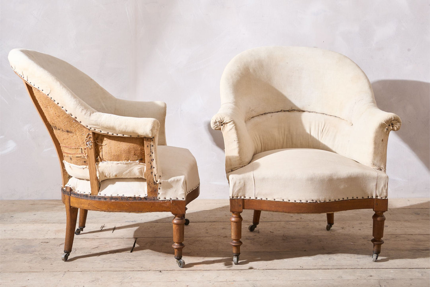 Pair of 19th century French tub chairs with show wood frame