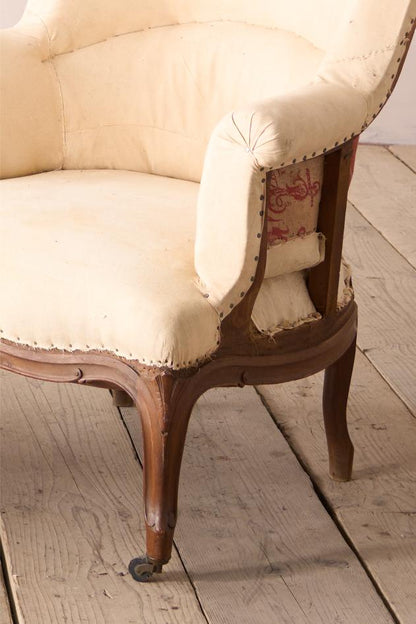 19th century French armchair with matching footstool