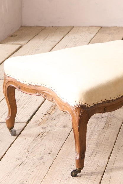 19th century French armchair with matching footstool