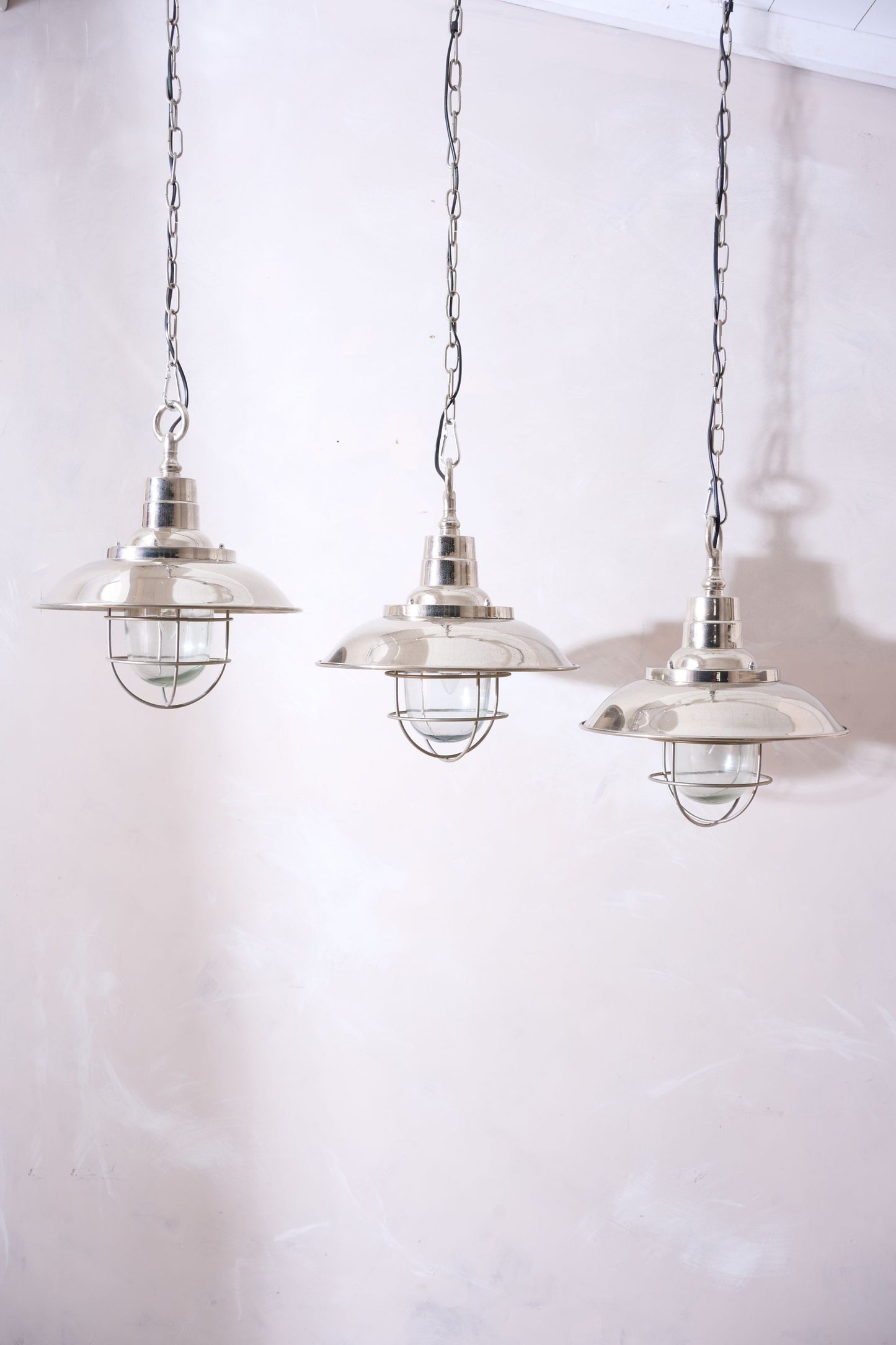 Trio of 20th Century Chrome pendant lights