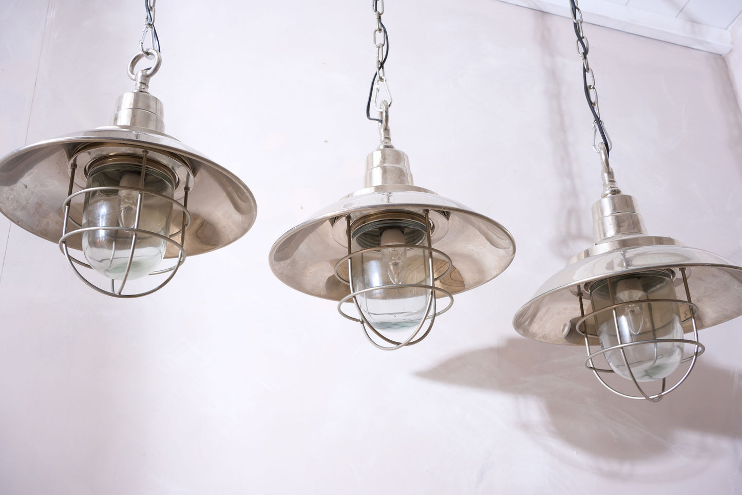 Trio of 20th Century Chrome pendant lights