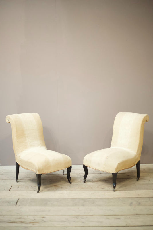 Pair of Napoleon III scroll back nursing chairs